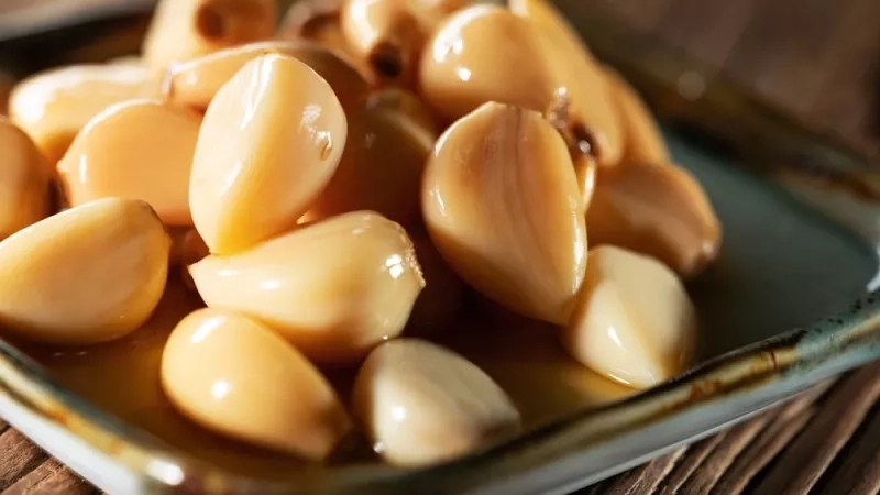 Recette d’ail confit : une saveur douce et parfumée