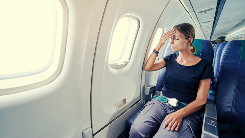 femme en avion