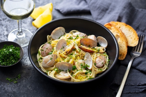 Recette authentique des spaghettis alla vongole : un voyage en Italie