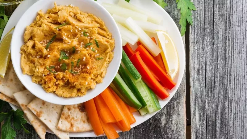 Recette d'houmous de poivrons : une tartinade colorée et pleine de saveurs