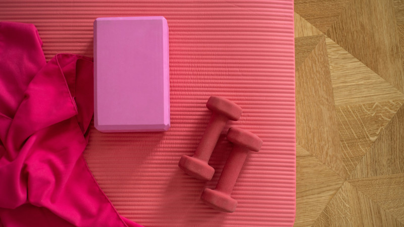 pink exercise mat with weights