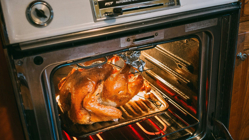 grilled chicken on black and silver grill